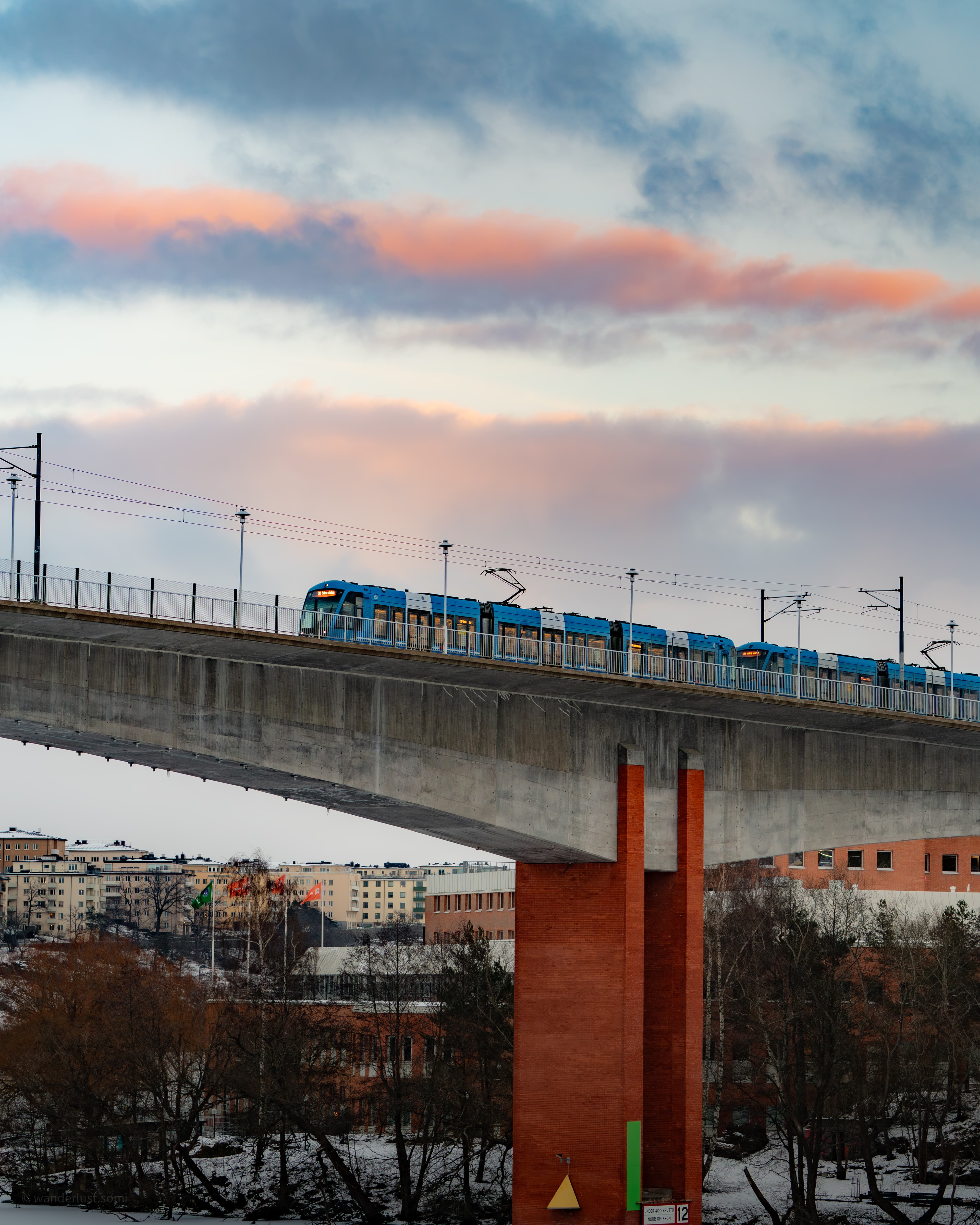 Tram on Bridge - an urban transit photograph